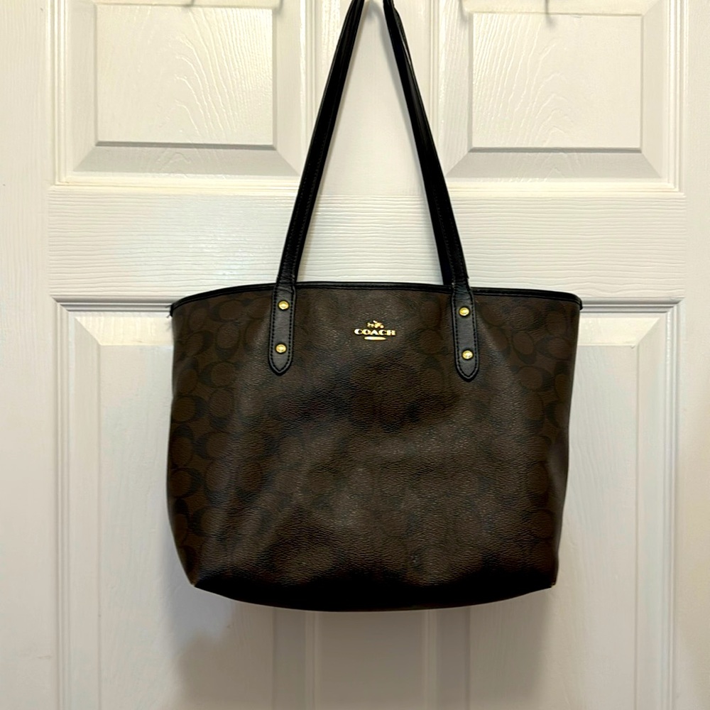 Coach signature with dark brown & black C,s